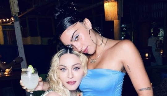 Madonna's daughter tried on the most skimpy knitted dress we've ever seen