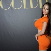 Model from China went too far with implants in the buttocks and now can not sit