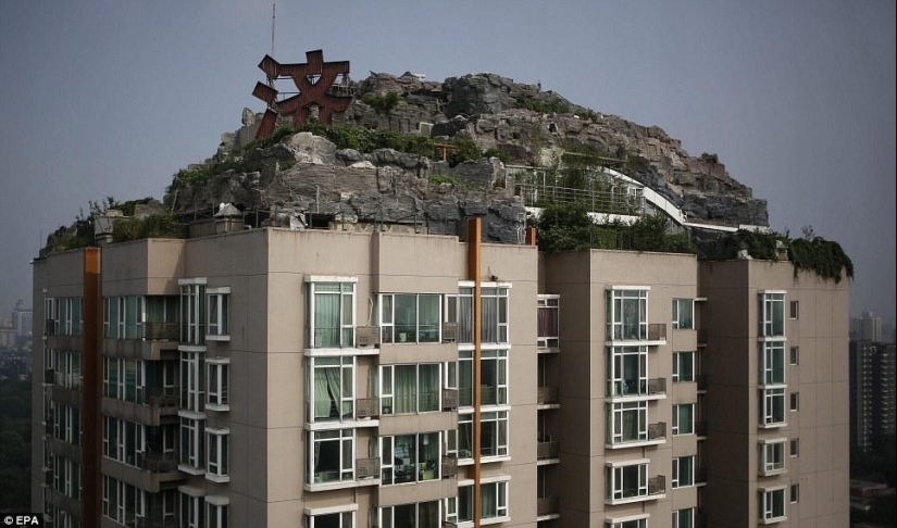Mountain villa on the roof of an apartment building