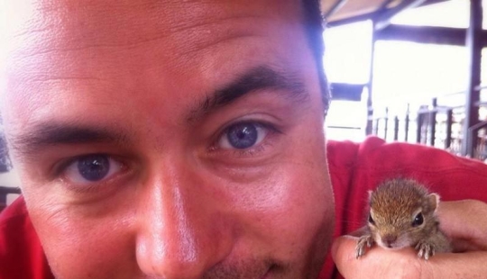 Orphan squirrel and director are best friends