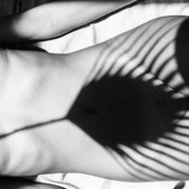 Photographer Emilio Jimenez covered the naked girls with a natural shadow