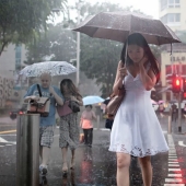 Rainy mood: a photographer from Singapore catches the emotions of people during a downpour