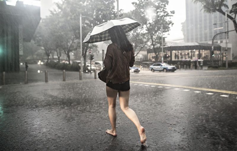 Rainy mood: a photographer from Singapore catches the emotions of people during a downpour