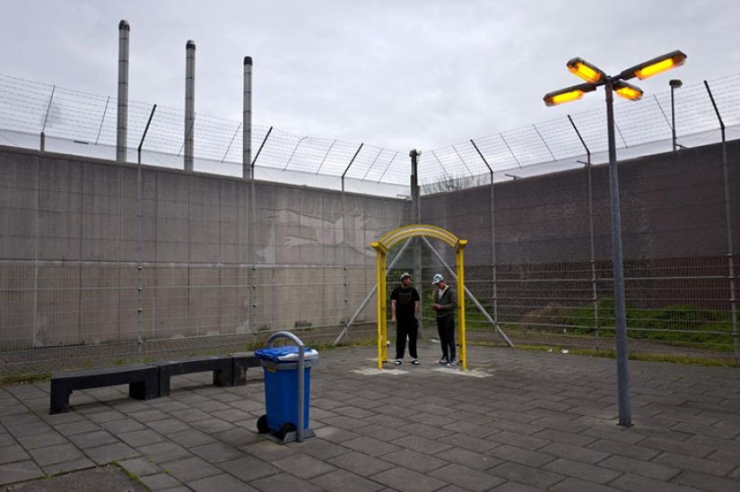 Refugees in the Netherlands are welcomed with open arms... and put in prison