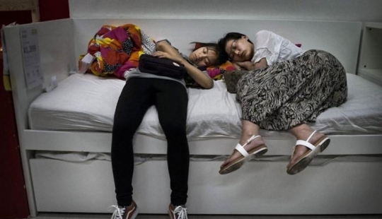 Sleepers in the IKEA store