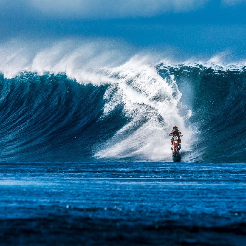 Surfing legend: Robbie Maddison rides a wave on a motorcycle