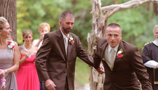 The bride&#39;s father stopped the wedding to walk his daughter down the aisle with her stepfather