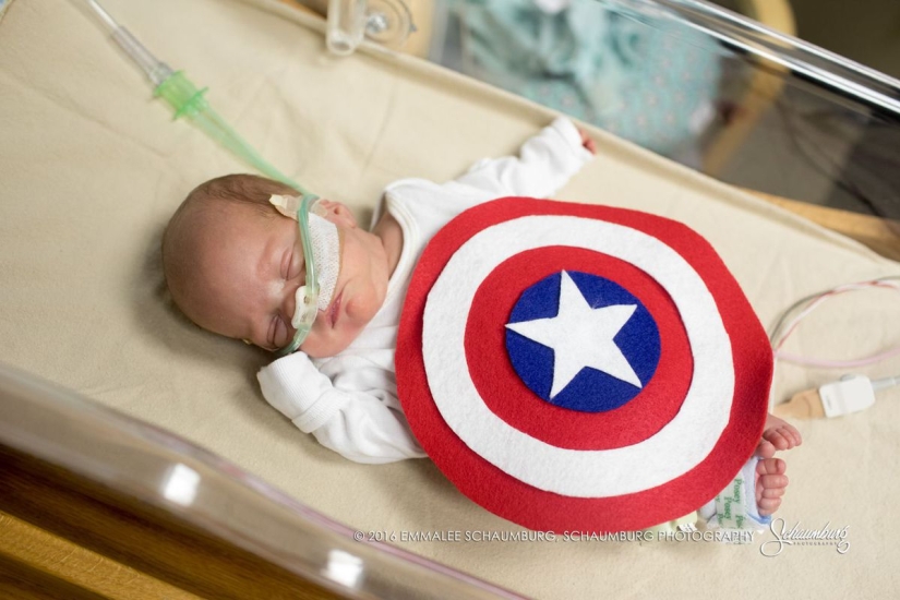 The Children's Hospital dressed up premature newborns in superheroes and arranged a photo shoot