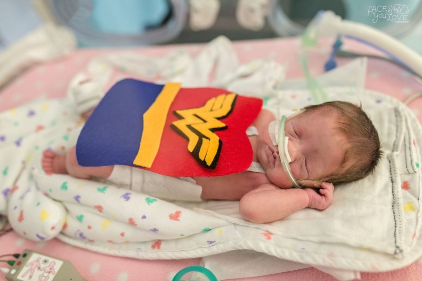 The Children's Hospital dressed up premature newborns in superheroes and arranged a photo shoot