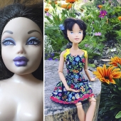 The girl draws realistic faces to old dolls and comes up with characters for them