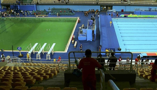 The pool at the Rio Olympics suddenly turned green, and no one admits