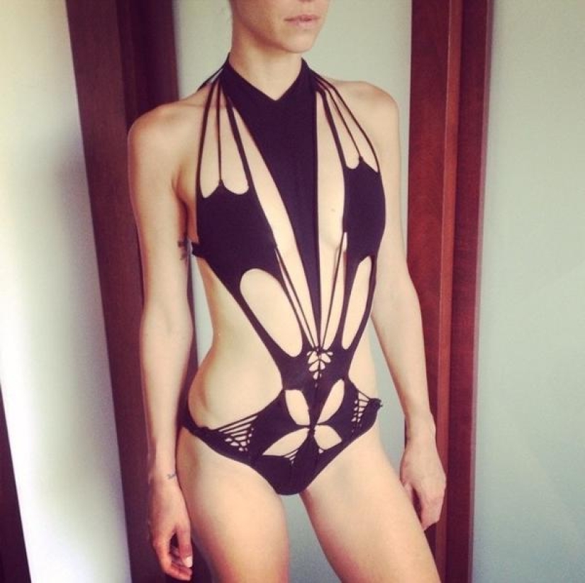 This designer just takes scissors and cuts sexy outfits right on the models