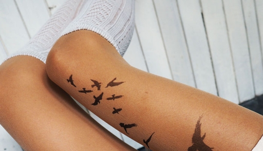 "Tights-tattoos" create the illusion of tattoos on the legs "Tights-tattoos" create the illusion of tattoos on the legs