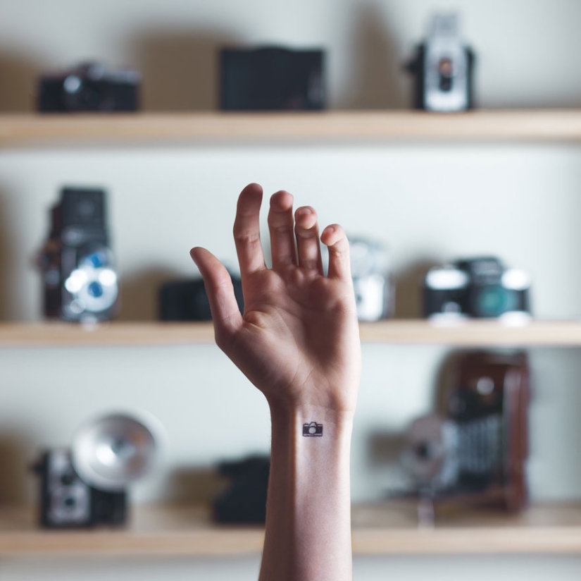 Tiny tattoos paired with a suitable background - this is real fine art!