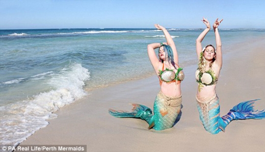 Two Little Mermaids: Disney-obsessed girlfriends have grown silicone tails and swim with sharks