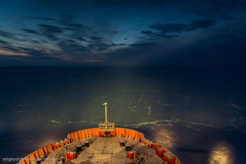 Unique photos of the icebreaker from the air at the Pole during the polar night