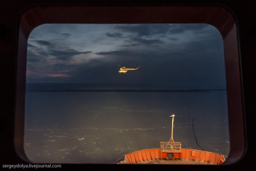 Unique photos of the icebreaker from the air at the Pole during the polar night