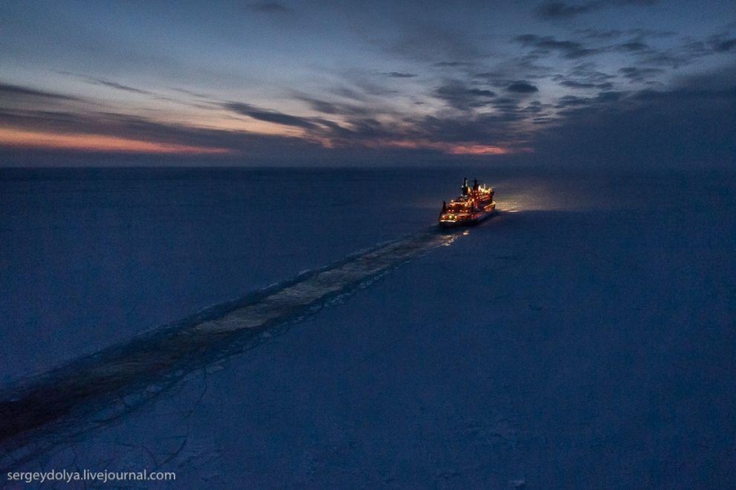 Unique photos of the icebreaker from the air at the Pole during the polar night