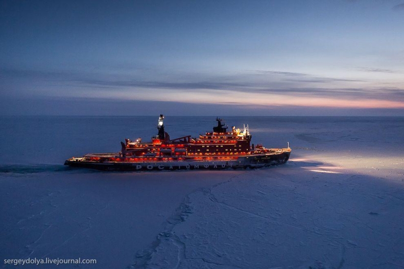 Unique photos of the icebreaker from the air at the Pole during the polar night