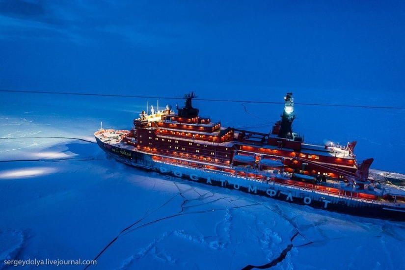 Unique photos of the icebreaker from the air at the Pole during the polar night