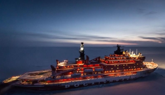 Unique photos of the icebreaker from the air at the Pole during the polar night
