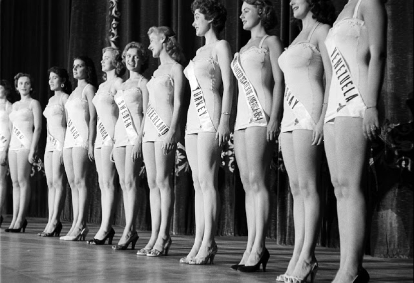 Watching the participants of the contest "Miss universe" 50 years