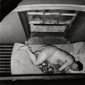 Weegee is a restless photographer who has been everywhere and everywhere