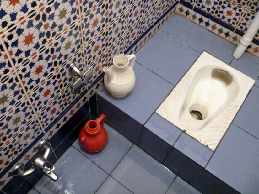 Why are there two different types of toilets in Turkish apartments