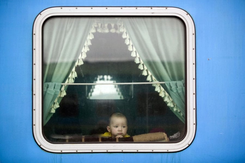 Why are train windows and airplane portholes made with rounded corners
