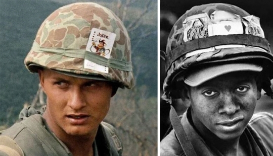 Why did American soldiers in Vietnam wear playing cards on their helmets