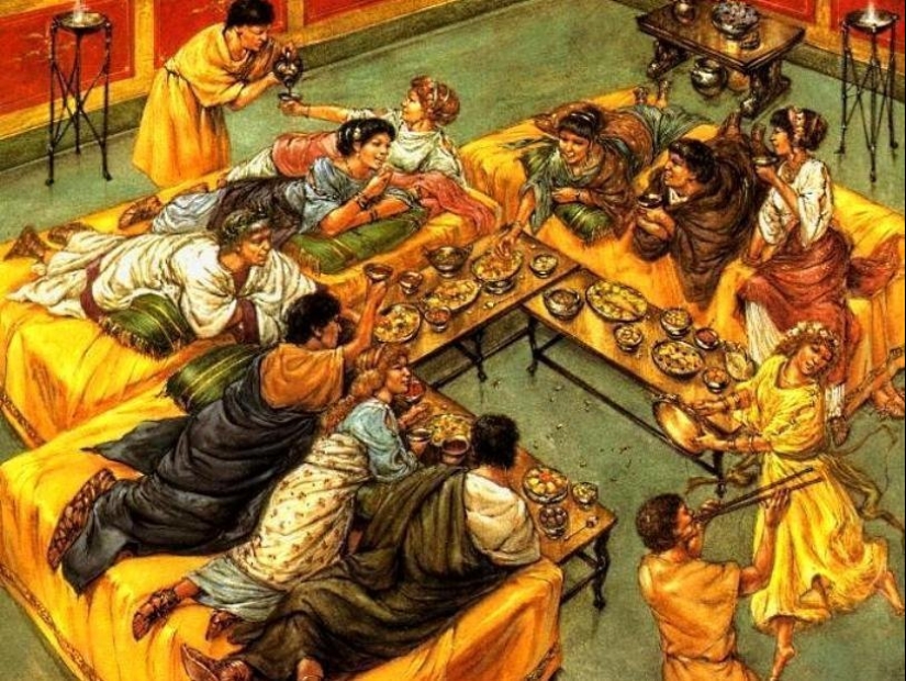 Why did the ancient Romans and Greeks eat lying down