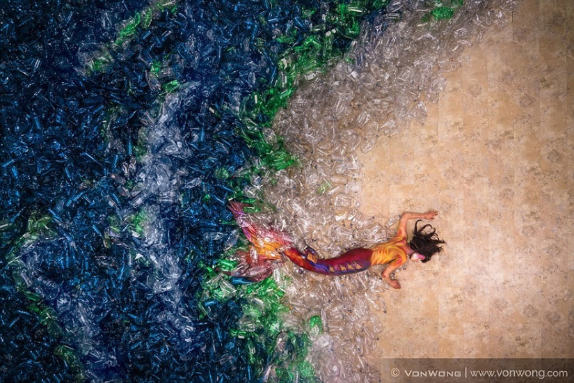 Why did the photographer drown the mermaids in plastic bottles