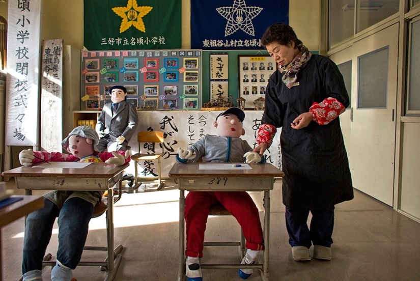 Why do 35 people and 150 stuffed animals live in a Japanese village?