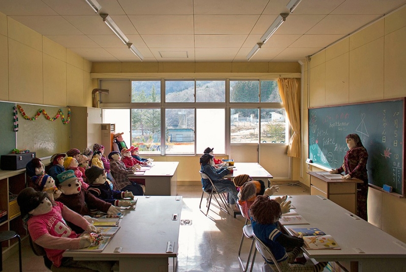 Why do 35 people and 150 stuffed animals live in a Japanese village?