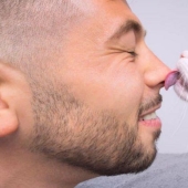 Why do cats lick people's faces