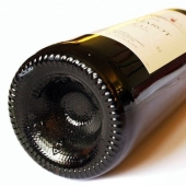 Why do wine bottles have a concave bottom