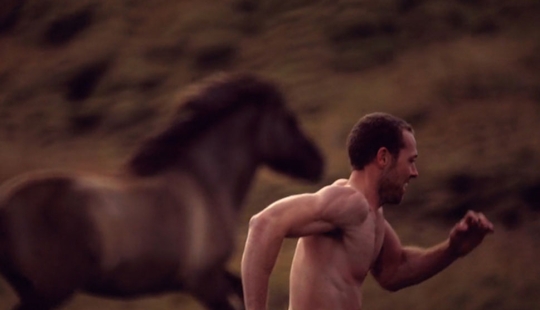 Why does this artist like to run with horses in the fields in what the mother gave birth to