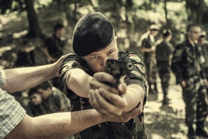 Young Hungarian patriots in a military camp