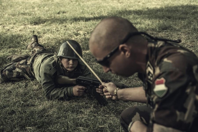 Young Hungarian patriots in a military camp