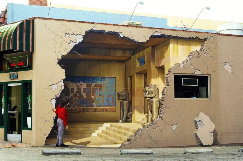 18 cool street art works that open a portal to another world