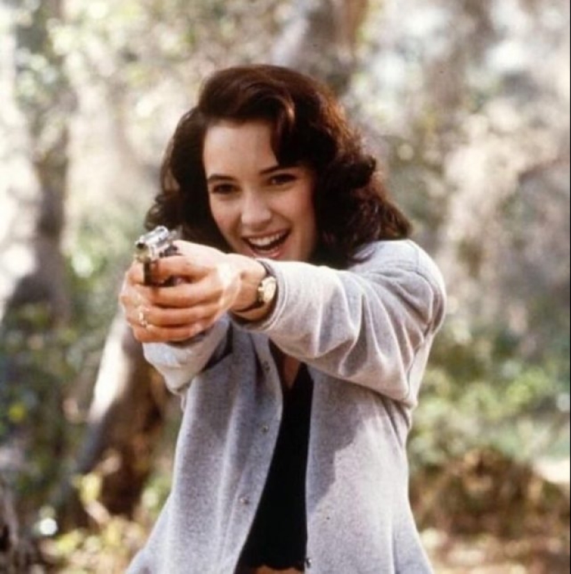 20 famous girls with guns in their hands