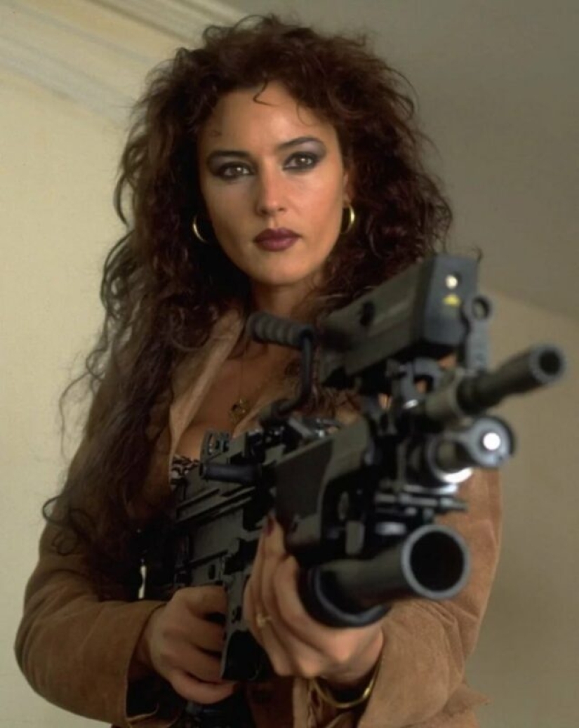 20 famous girls with guns in their hands