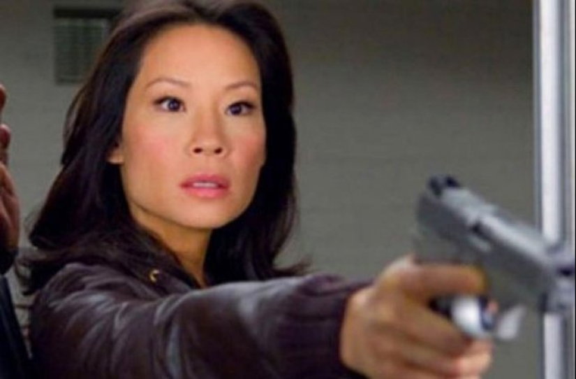 20 famous girls with guns in their hands