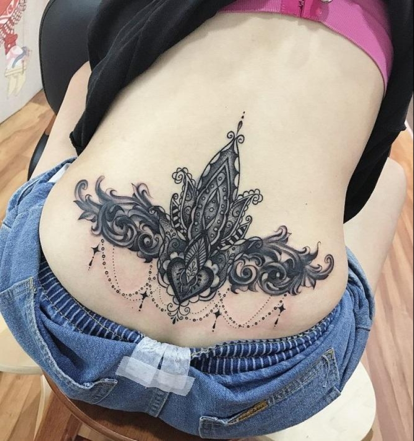 22 tatuajes de muñones de vagabundo de moda en la espalda baja