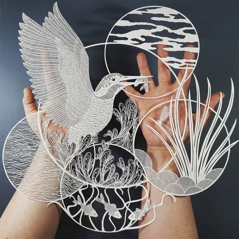 A girl cuts out intricate masterpieces from paper