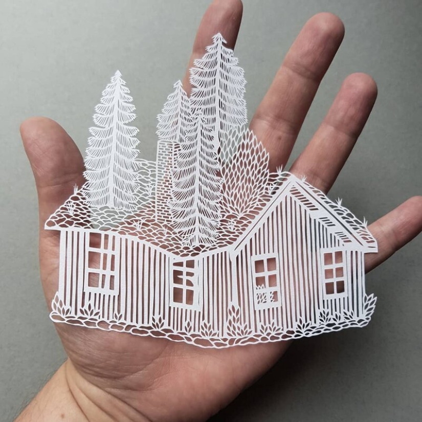 A girl cuts out intricate masterpieces from paper