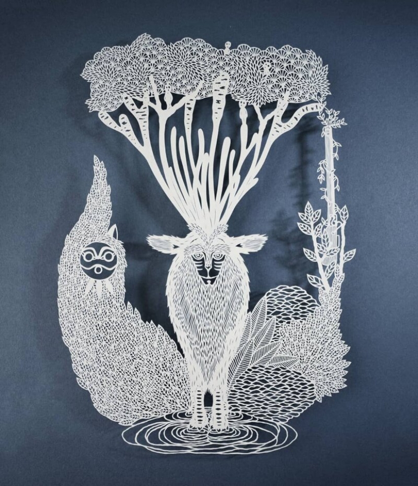 A girl cuts out intricate masterpieces from paper