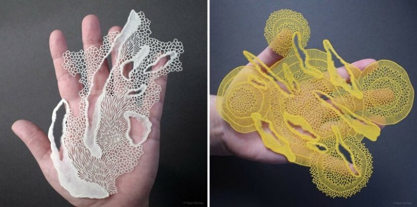 A girl cuts out intricate masterpieces from paper