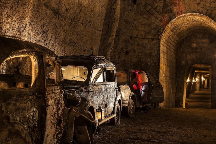 Abandoned tunnel under Naples, which became a crypt for cars