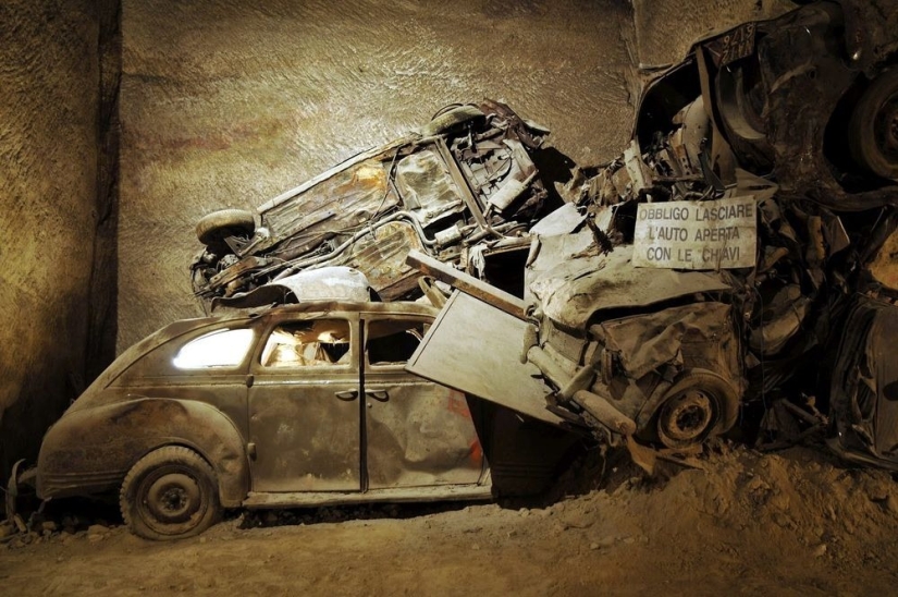 Abandoned tunnel under Naples, which became a crypt for cars